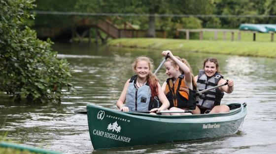 campers canoeing