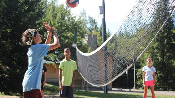 campers playing volleyball