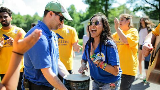 Camp staff signing and dancing