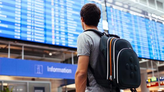 Stock photo of traveler at airport