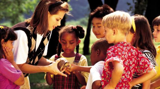 Kids Outdoors With Teacher