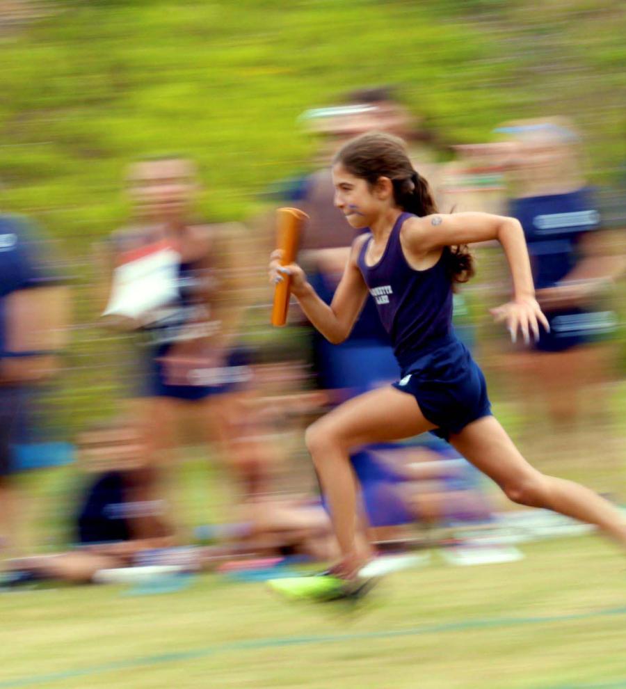 Camper running track and field