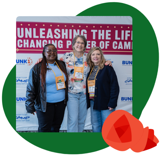 Attendees in front of banner