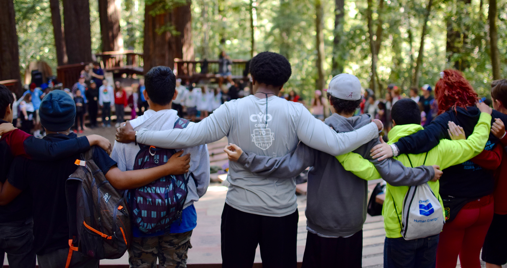 Group of staff and campers in a circle