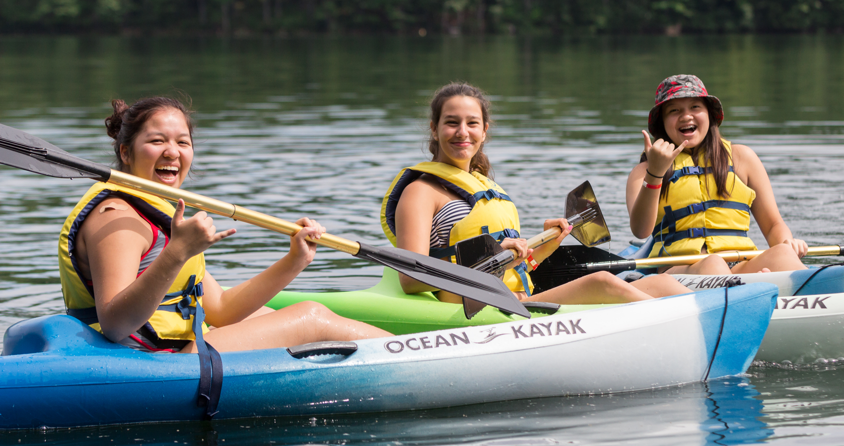 Three campers kayaking