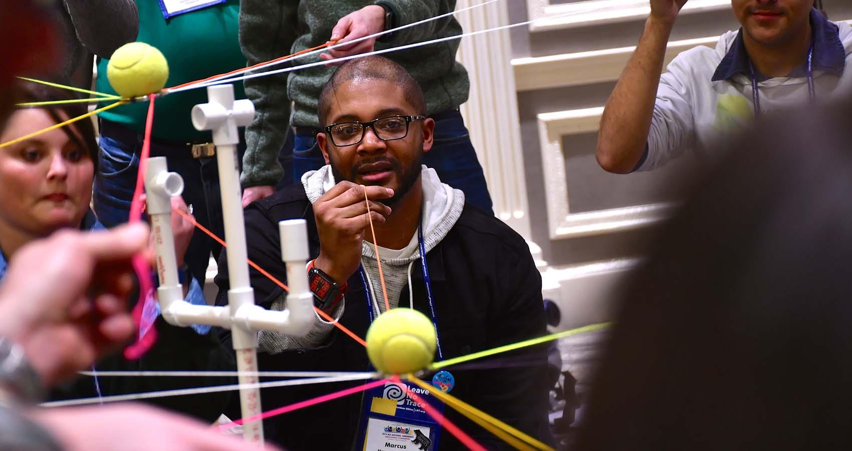 Conference attendee participating in a session