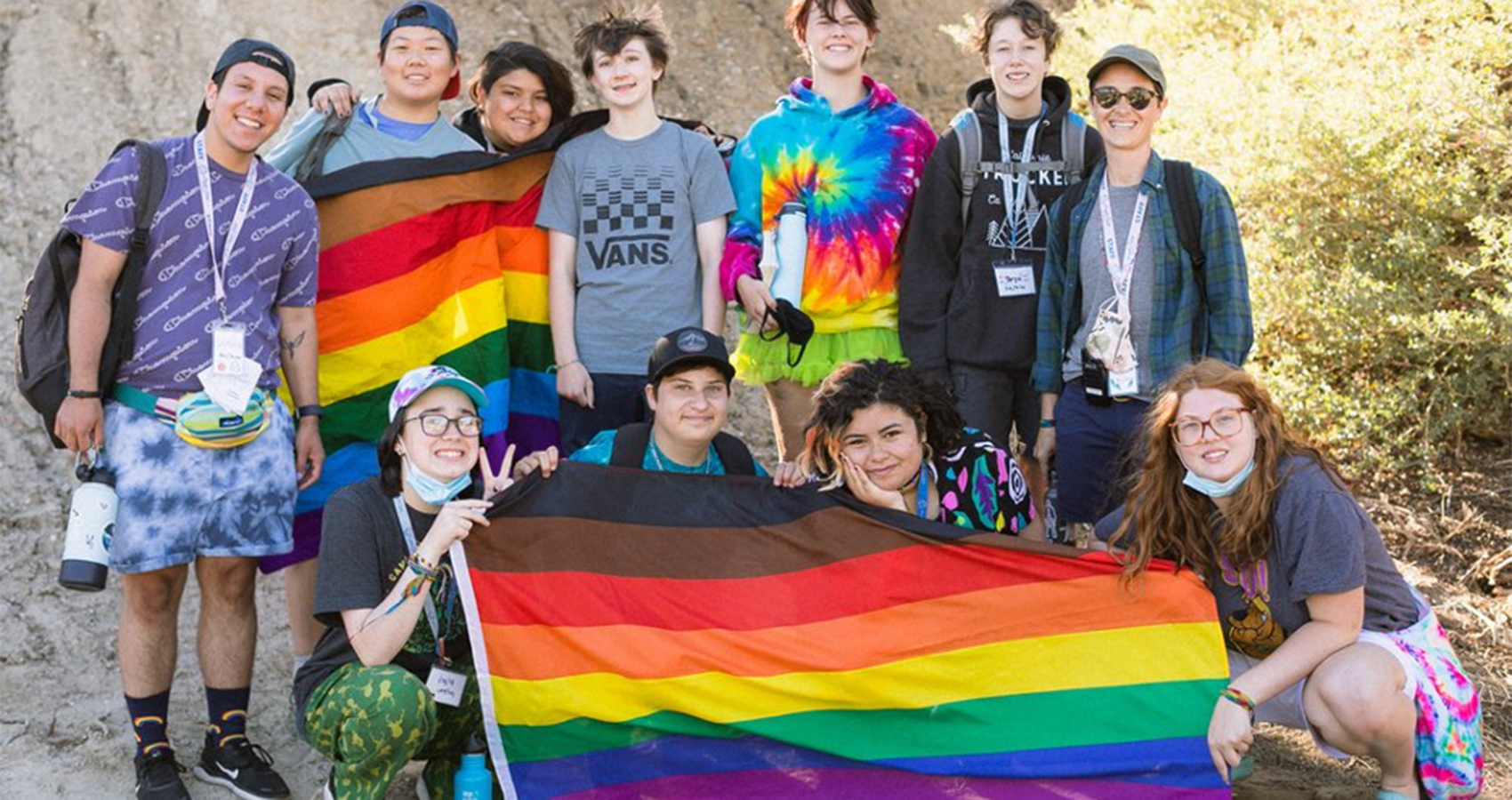 Camp Brave Trails campers with flag