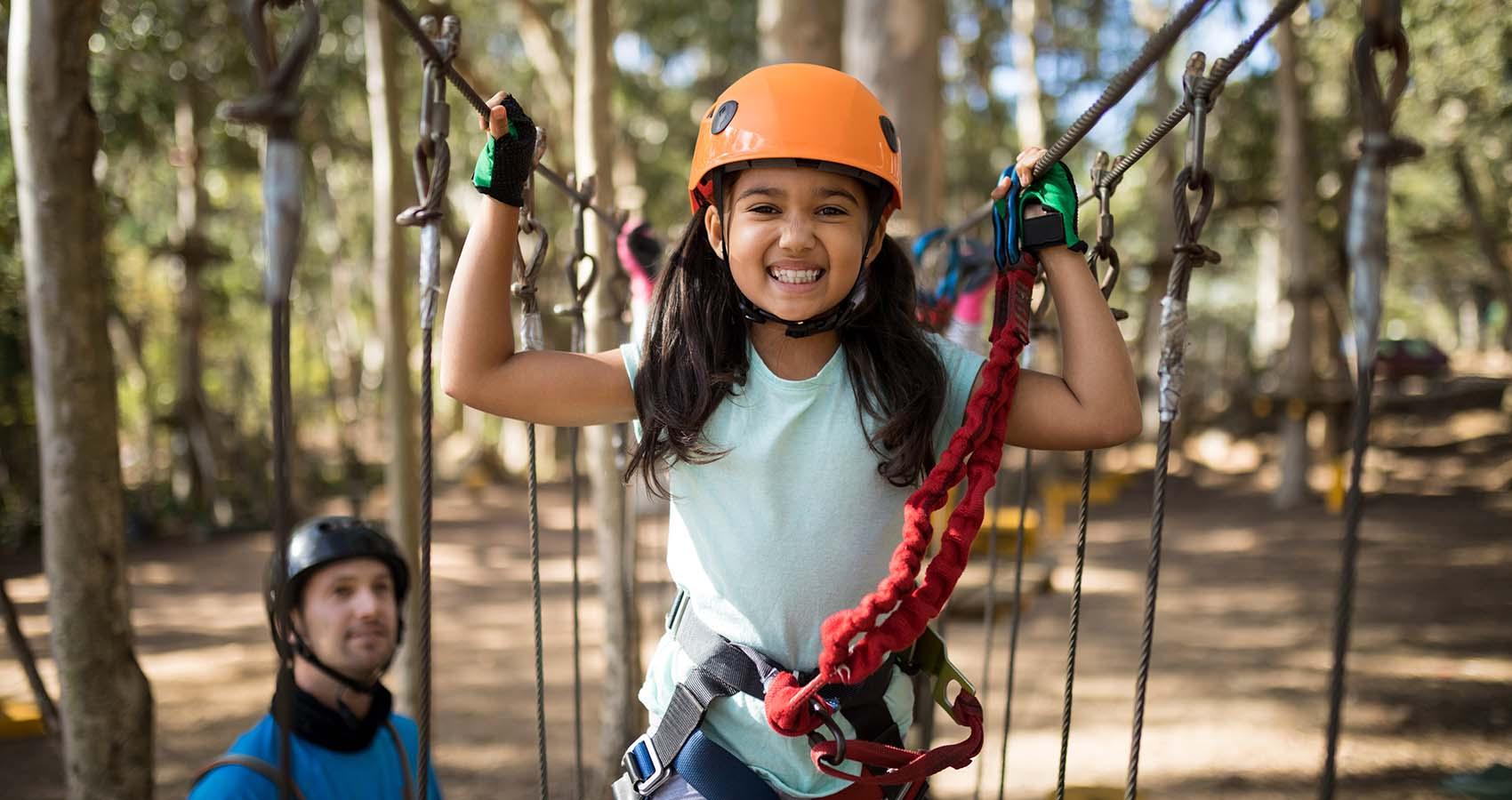 stock photo of girl on ropes course