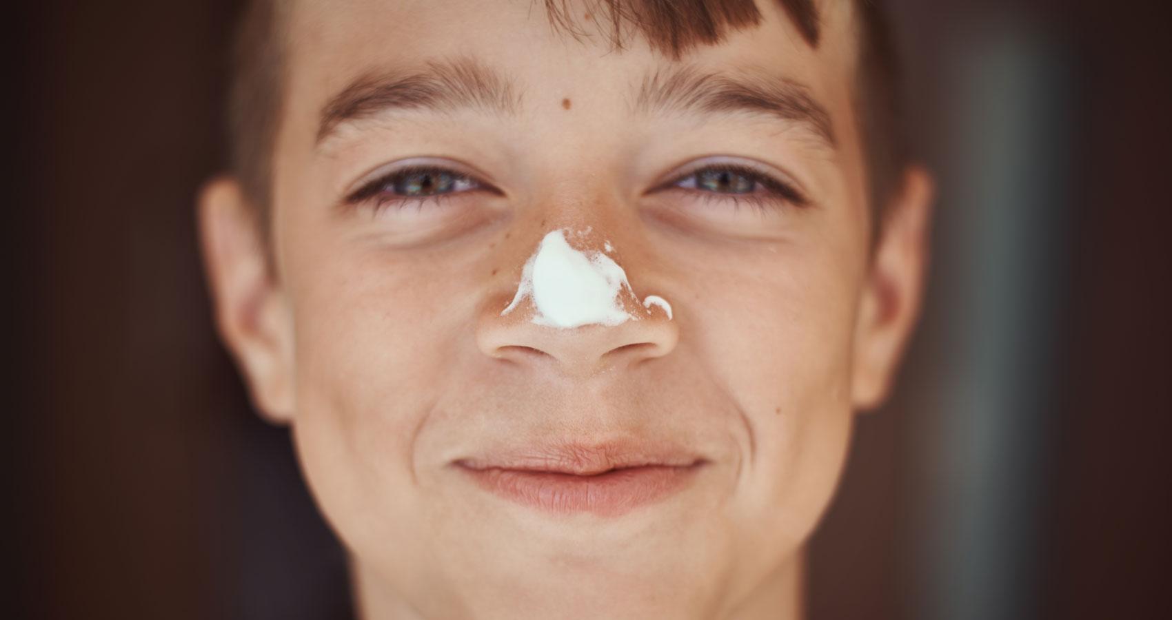 Camper with sunscreen on nose