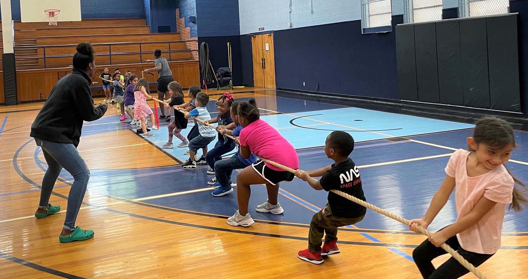 campers in a tug-of-war