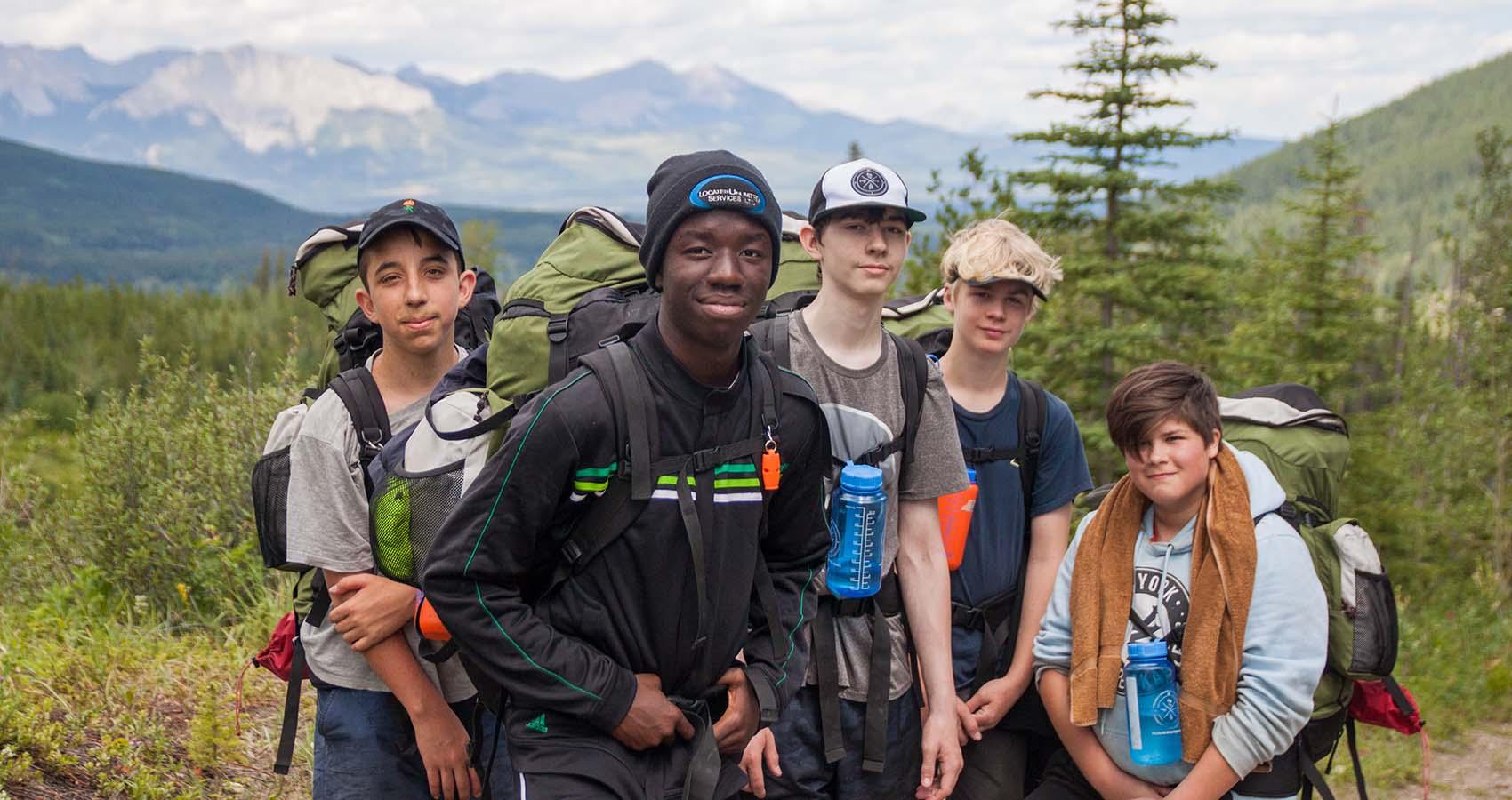 boys hiking in mountains