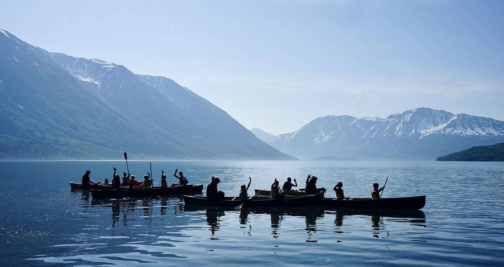 campers and staff canoeing