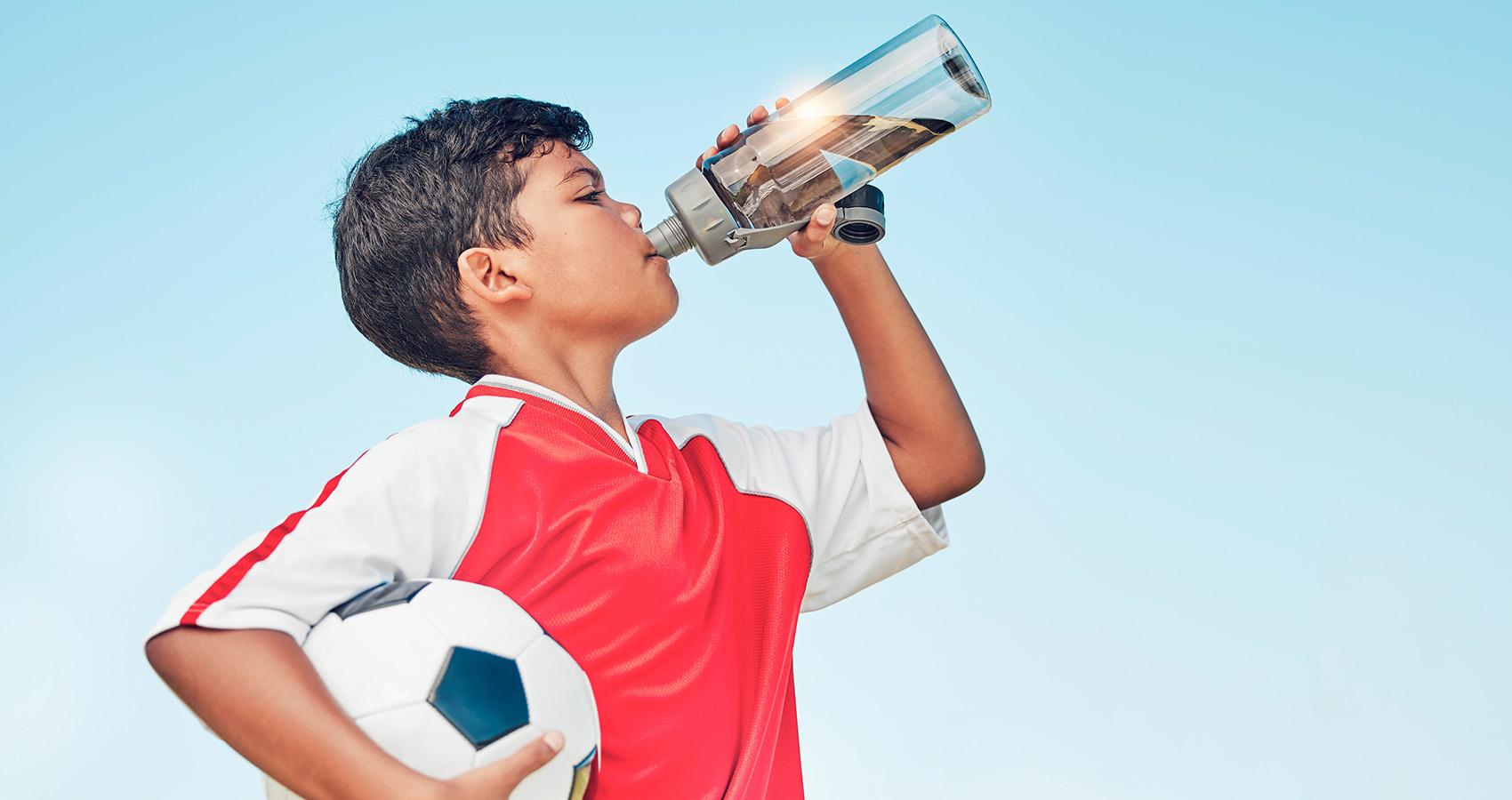 Kid drinking from water bottle