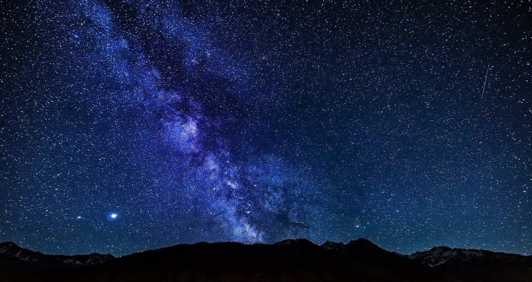 Stars at night over mountains