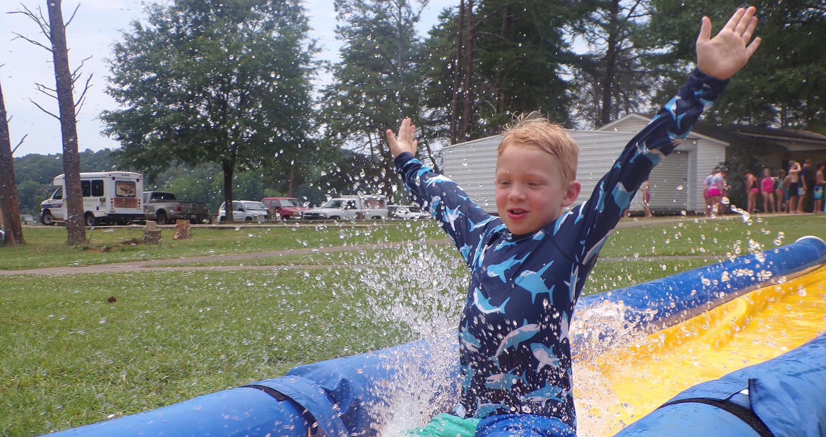 camper on slip n slide