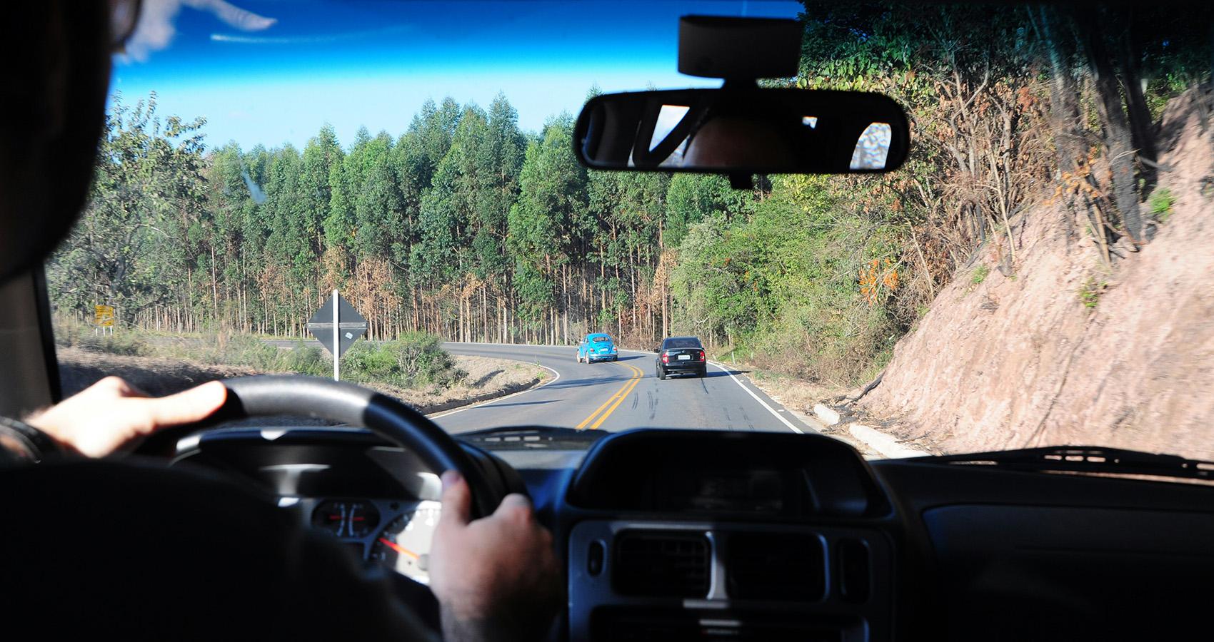 Driver with others cars visible through windshield