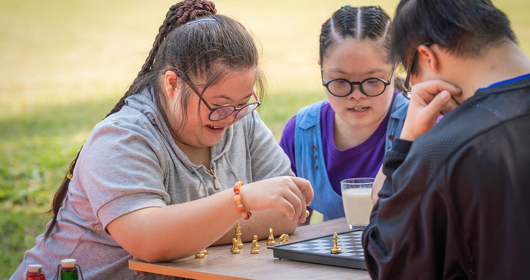 people playing board game