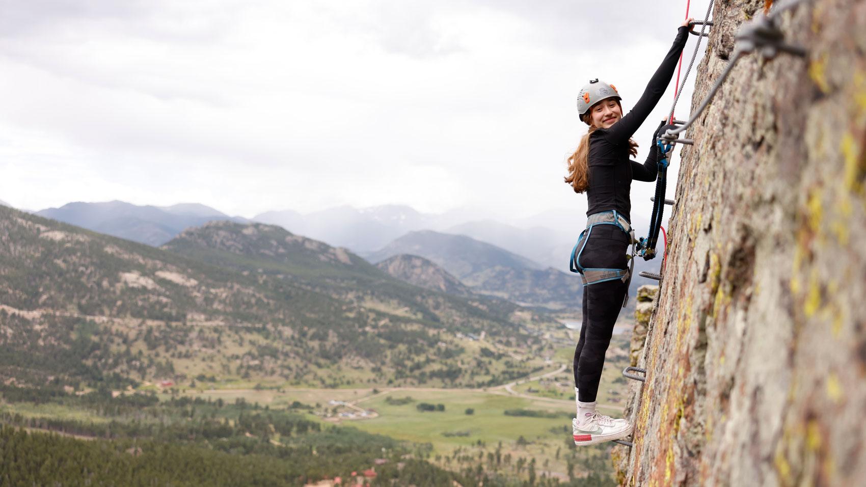 Camper rock climbing