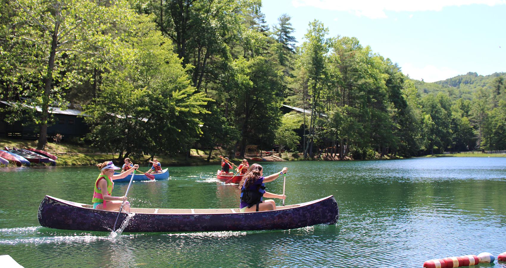 campers canoeing