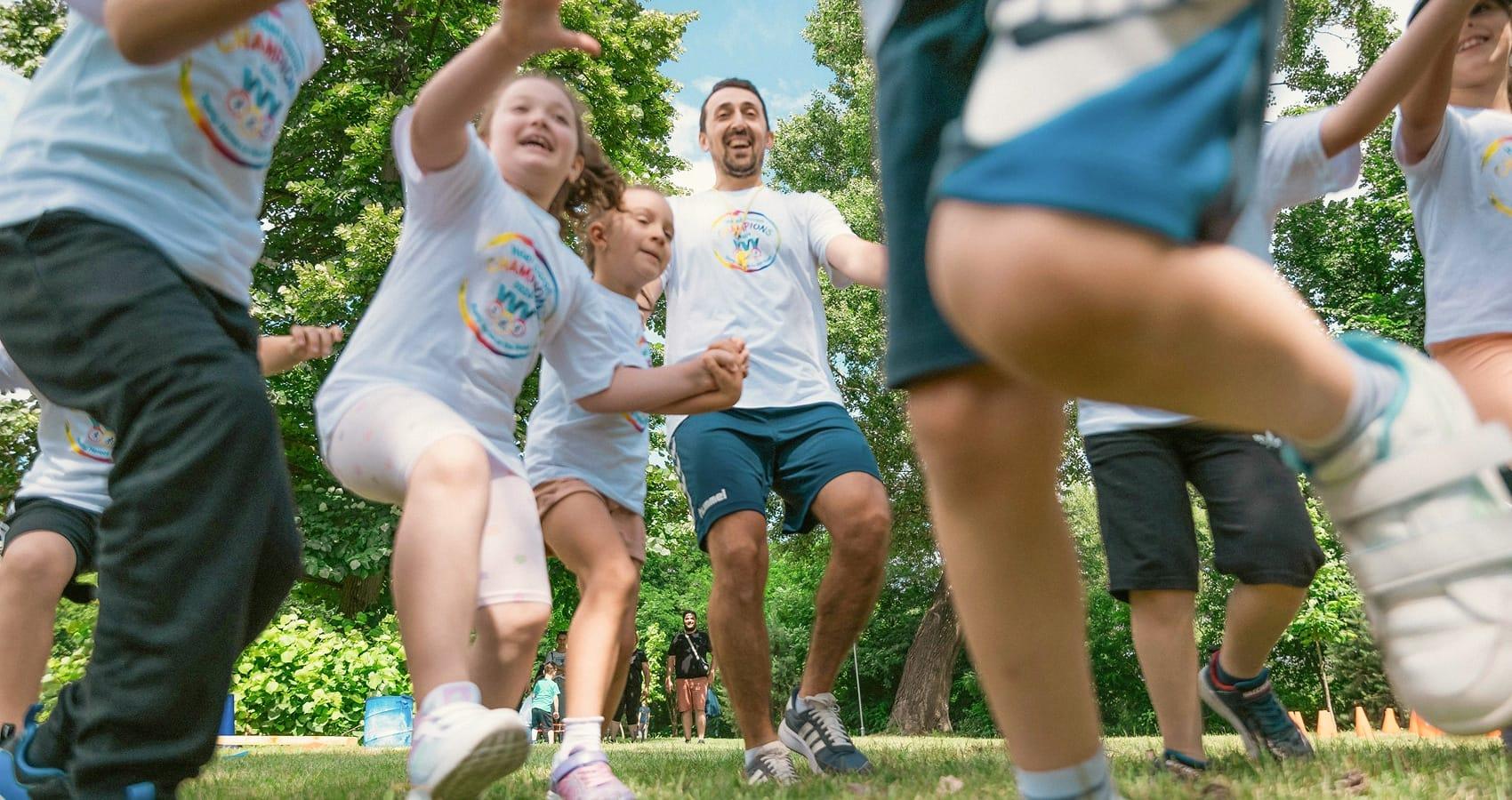 Campers and staff having fun in outdoor activity