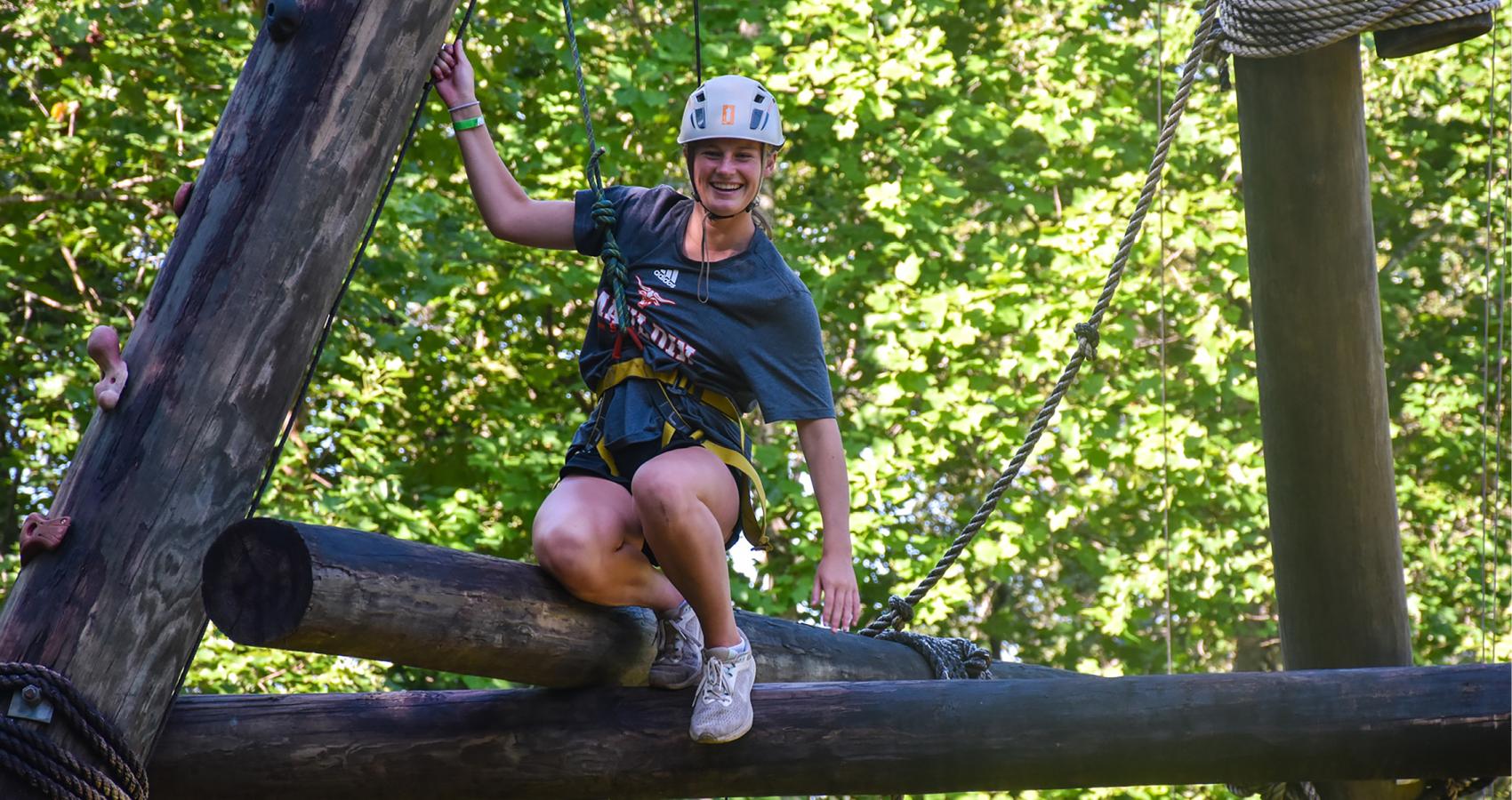 Teen camper on a ropes course