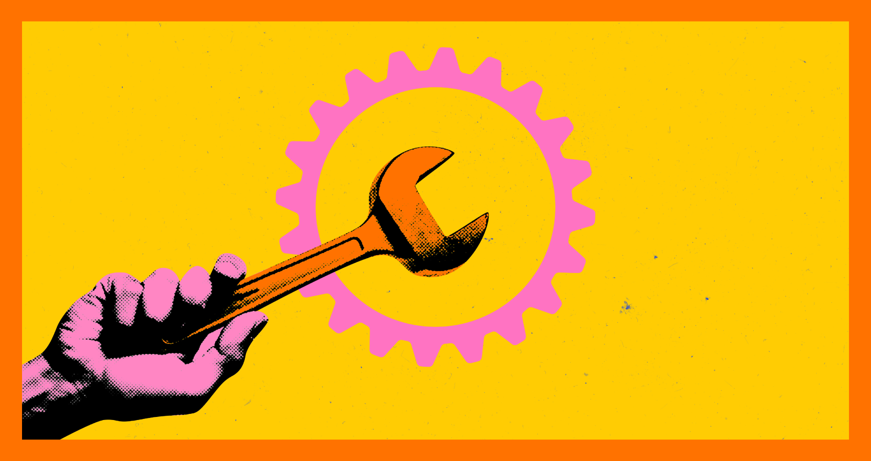Hand holding wrench in front of a gear