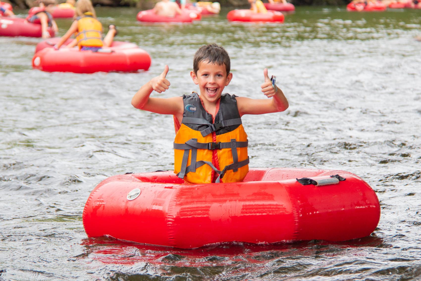 camper on water tube