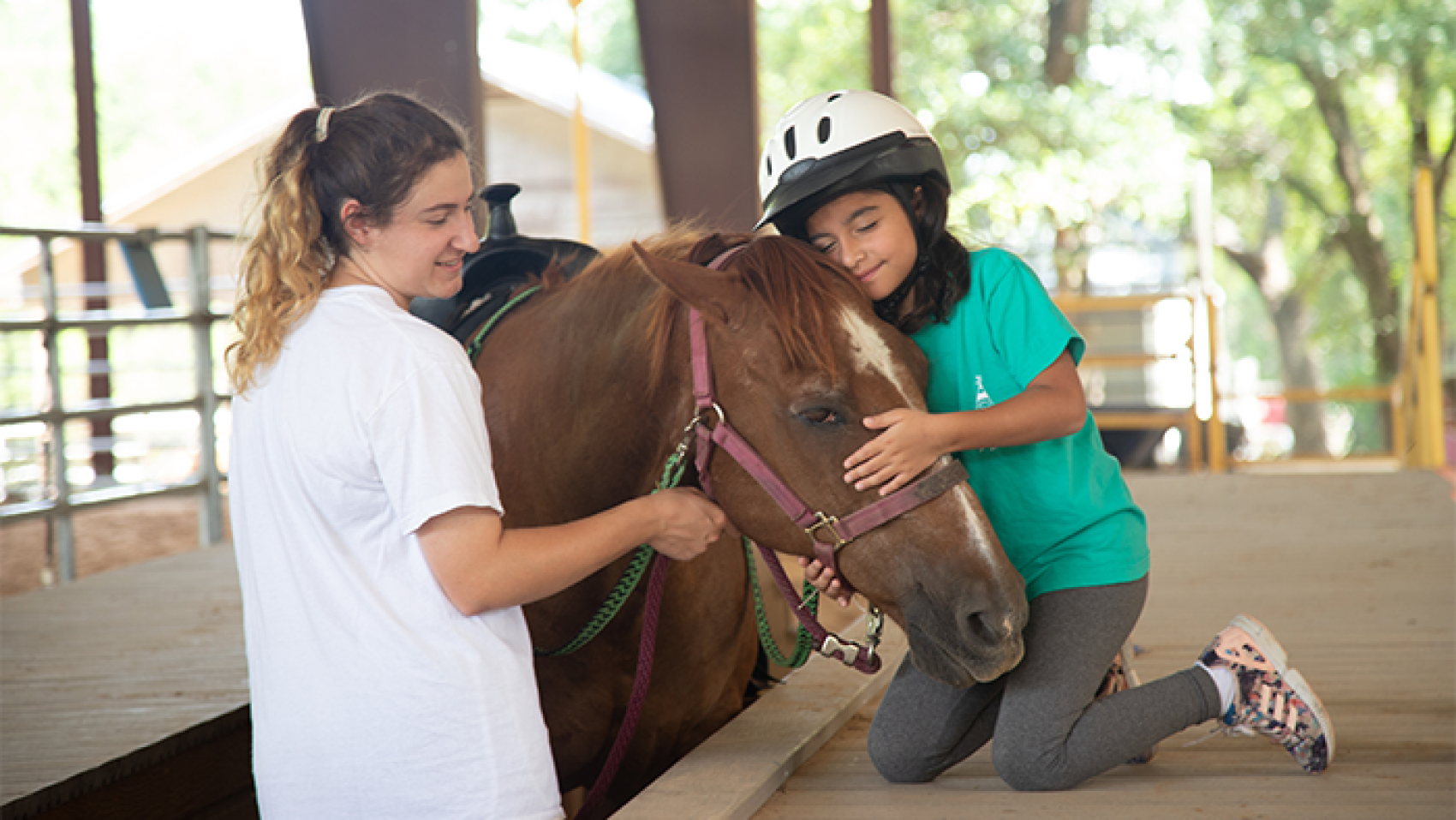 camper and staff with horse