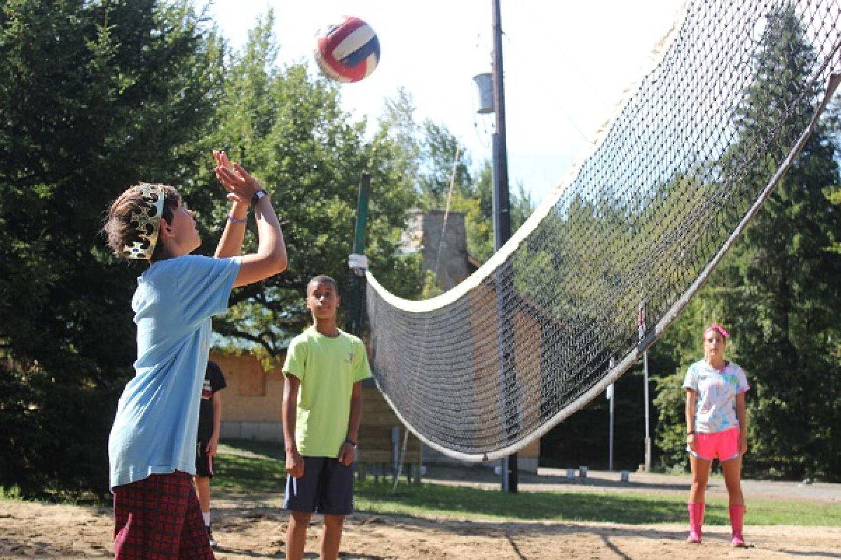 campers playing volleyball