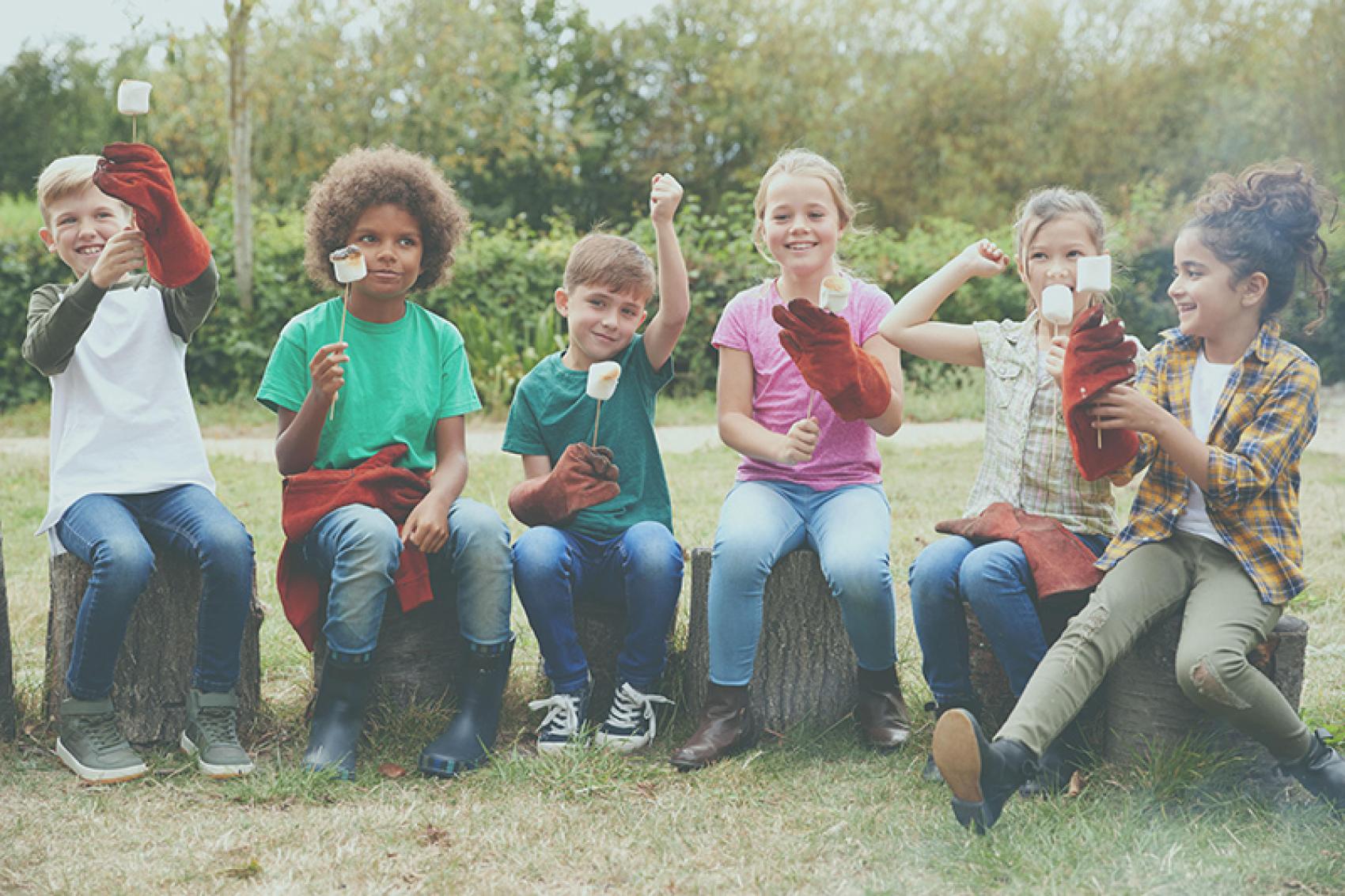 stock photo of kids holding roasted marshmallows