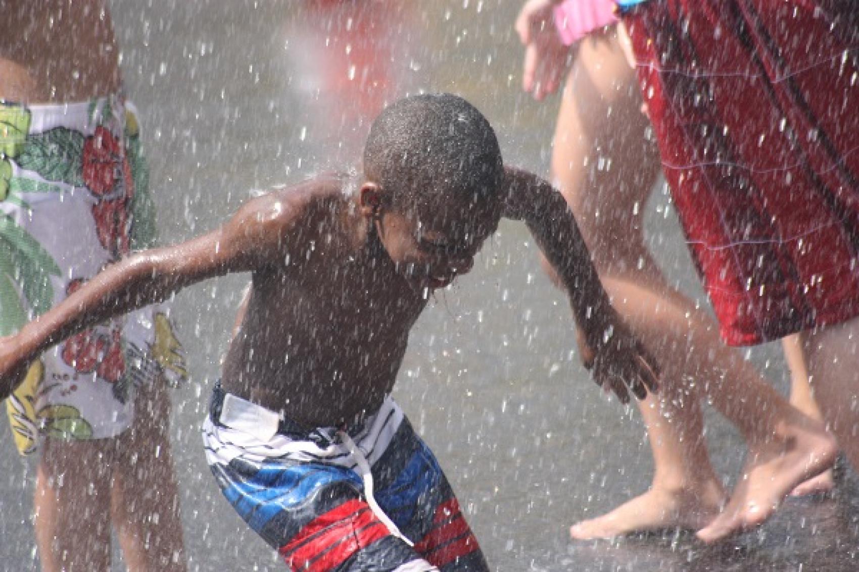 camper playing in water