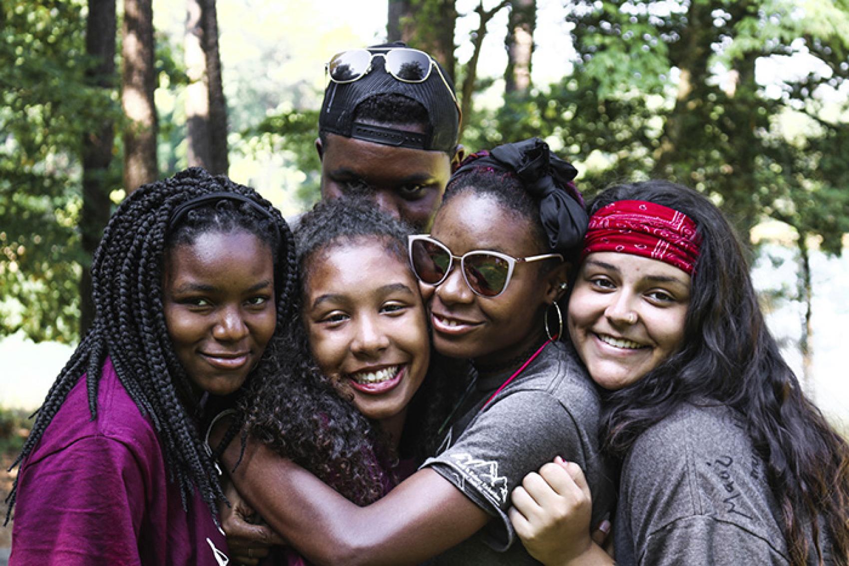 Staff in a group hug