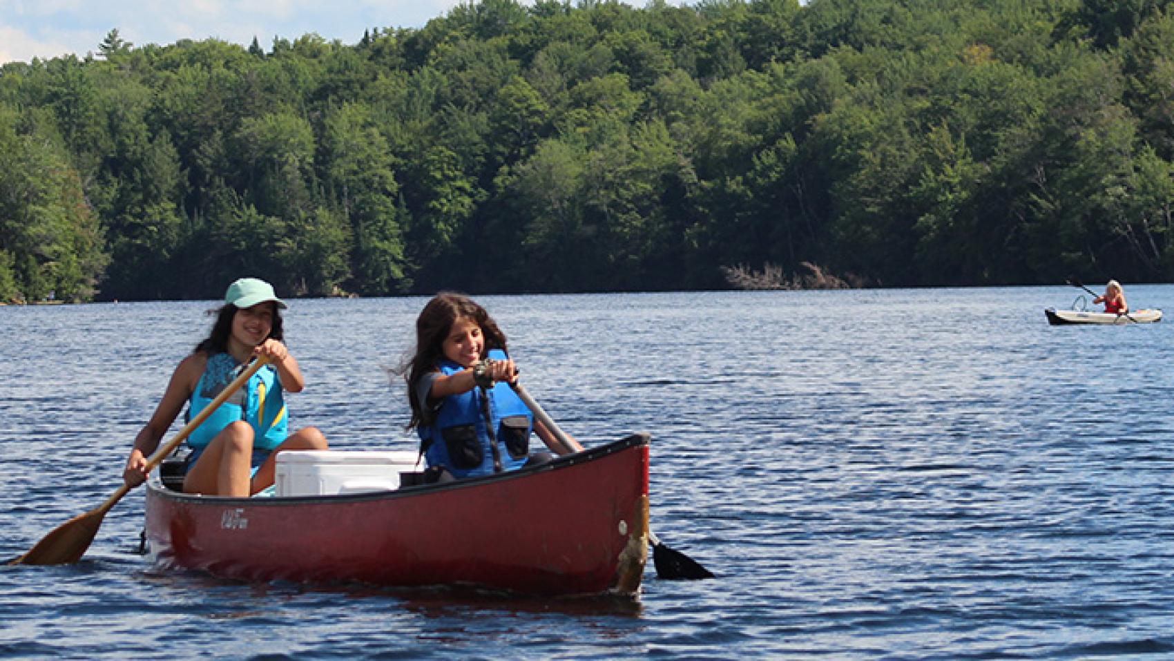 campers canoeing