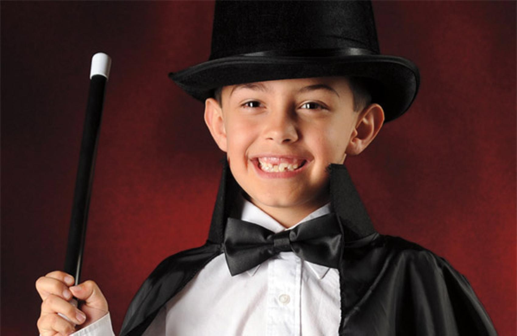 Kids dressed up as a magician