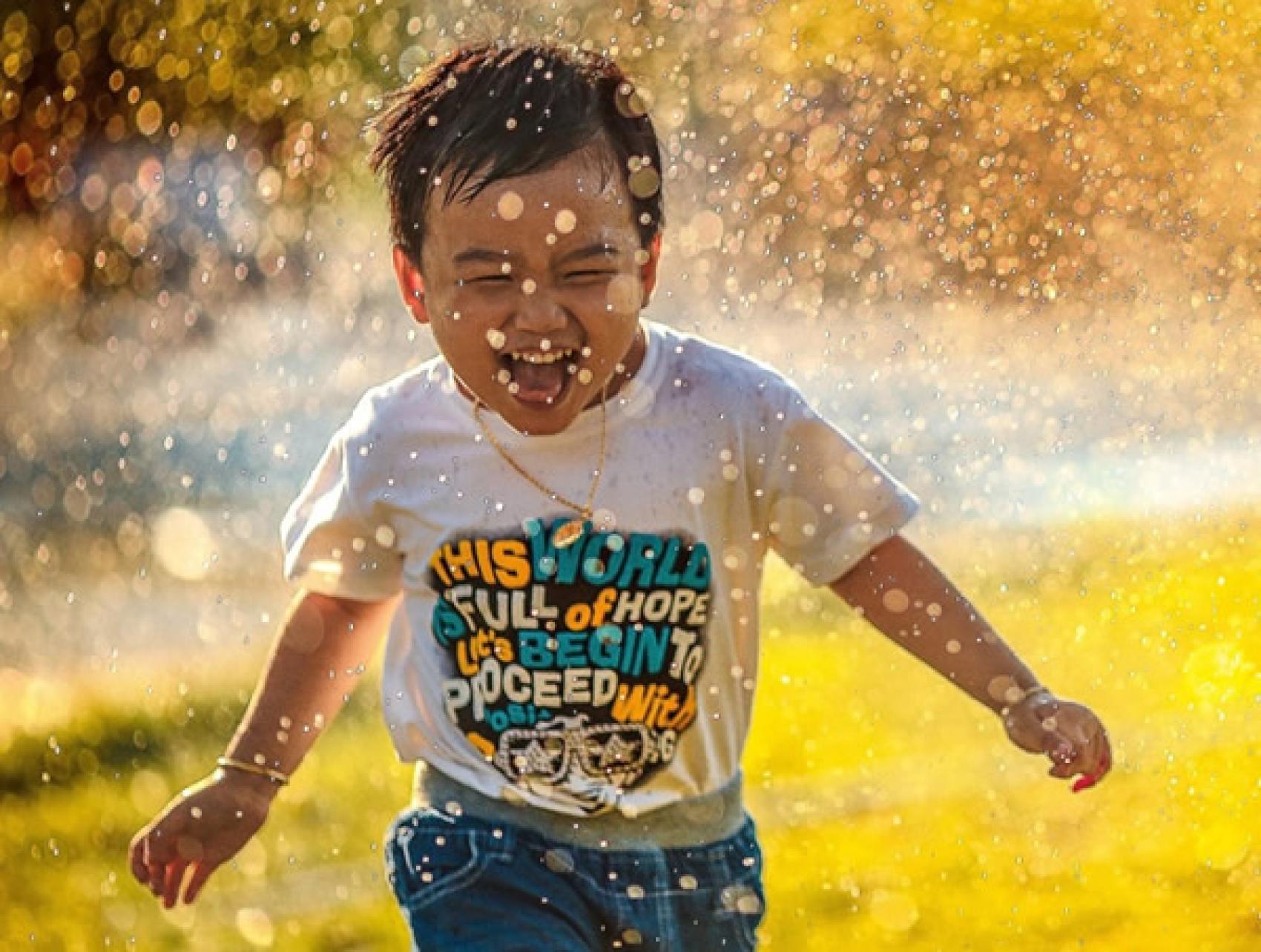 Camper running through rain shower