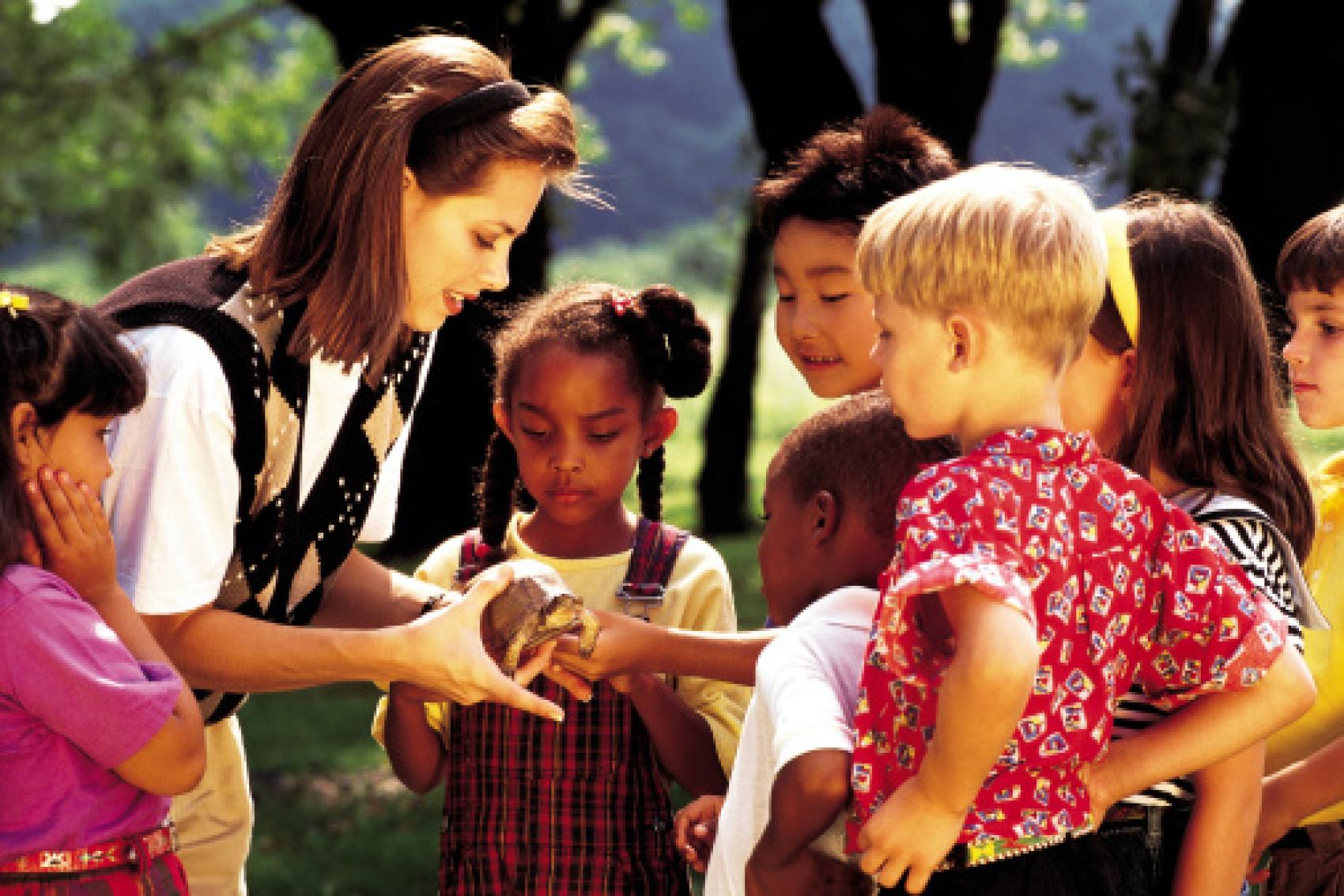 Kids Outdoors With Teacher