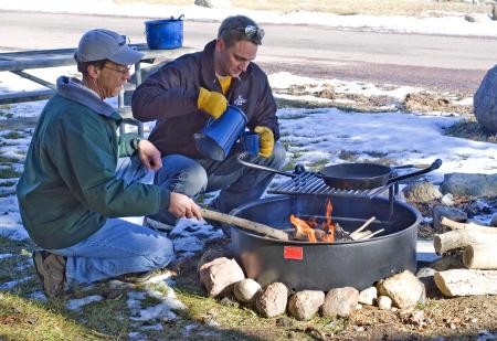 two people around a Pilot Rock campfire ring