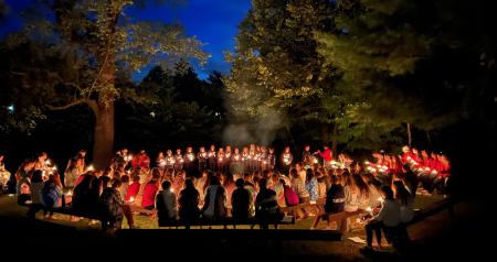 people around a campfire