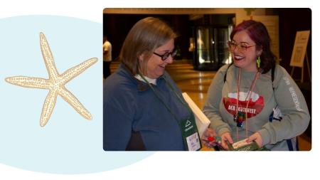 Attendees smiling at conference