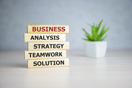 blocks that read business analysis strategy teamwork and solution