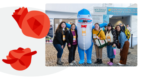 Attendees and Shark Mascot
