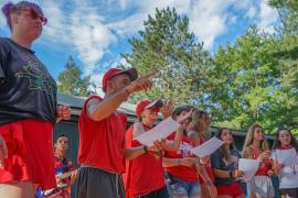 Staff speaking to campers