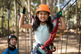 stock photo of girl on ropes course