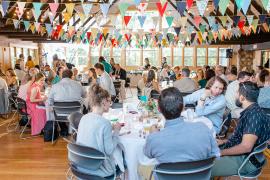 groups at circular tables indoors