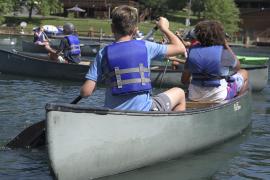 campers canoeing