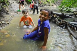 campers playing in water
