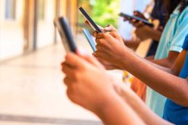 kids hands using smartphone