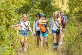 campers hiking on trail