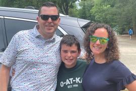 Marna with her fmaily at camp