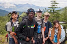 boys hiking in mountains